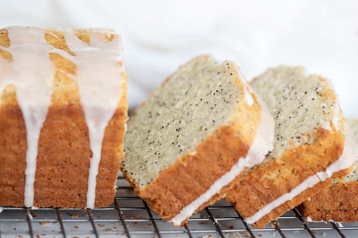 lemon poppy seed loaf, sliced on cooling rack