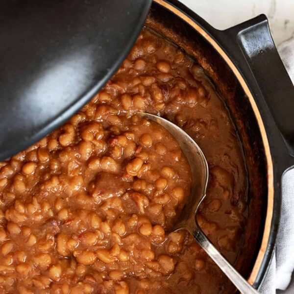 maple baked beans in pot with spoon