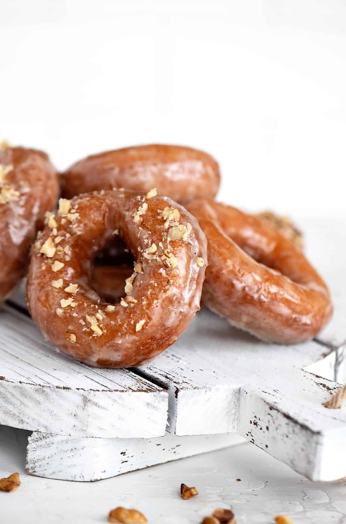 maple donuts on white tray
