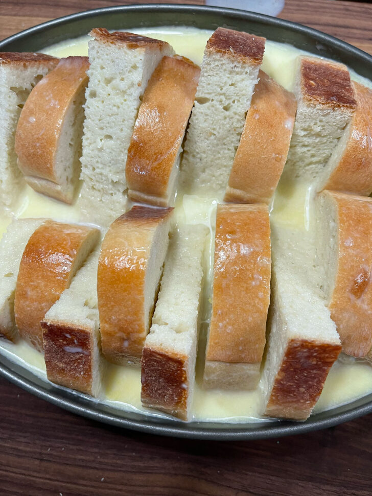 Custard poured over the bread slices.