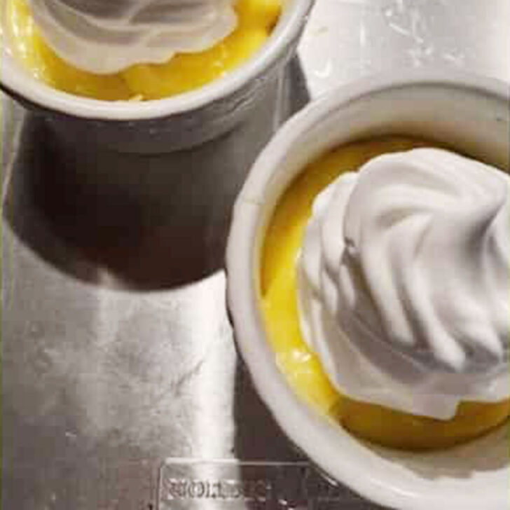 Meringue piped on top of the pudding.