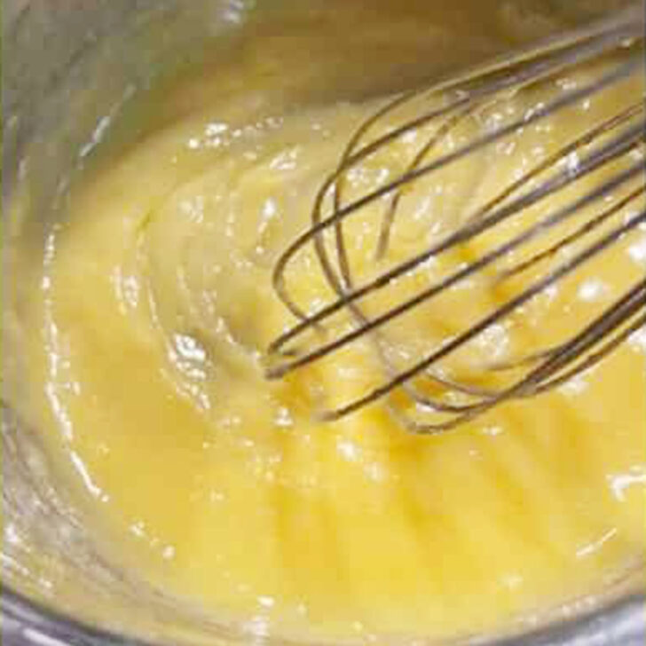 Cooking the pudding after adding the eggs.