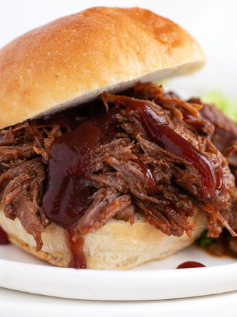 bbq beef on bun with bbq sauce
