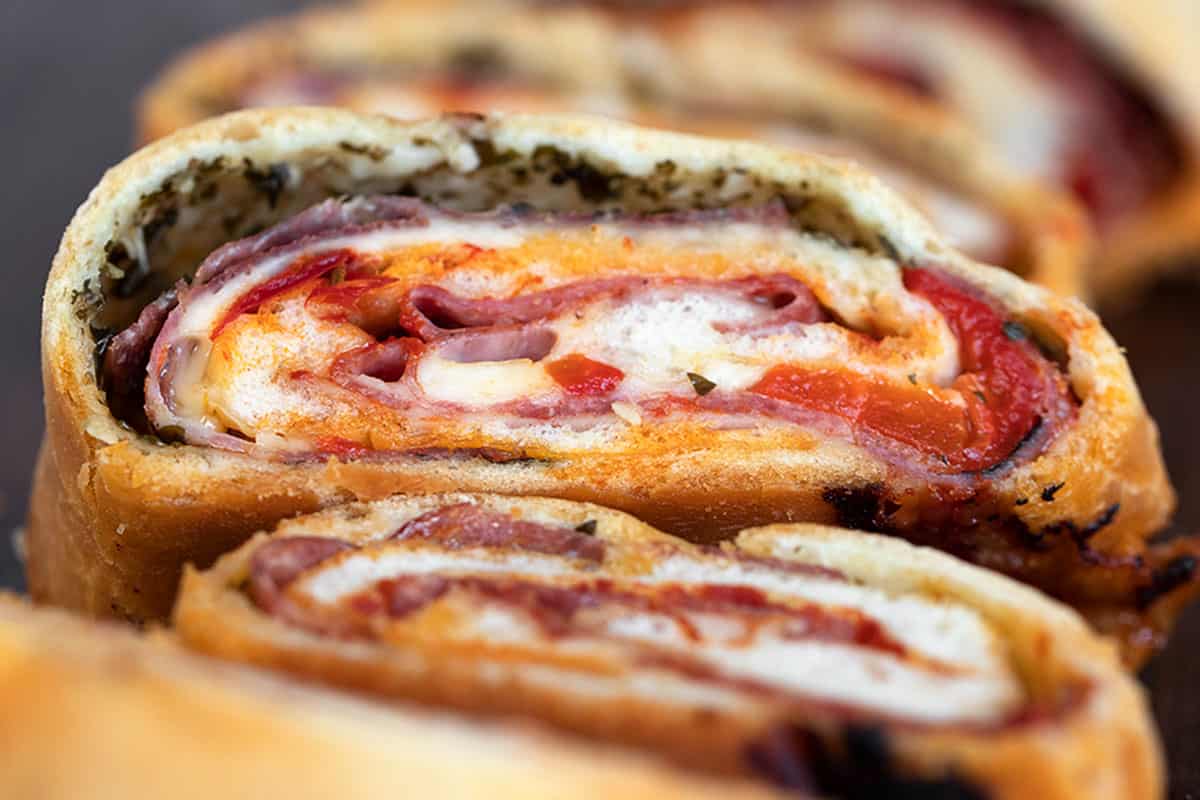 stromboli sliced on cutting board