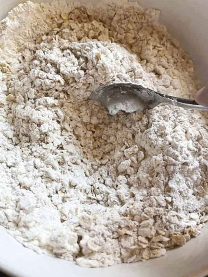 Dry ingredients stirred together in a bowl.