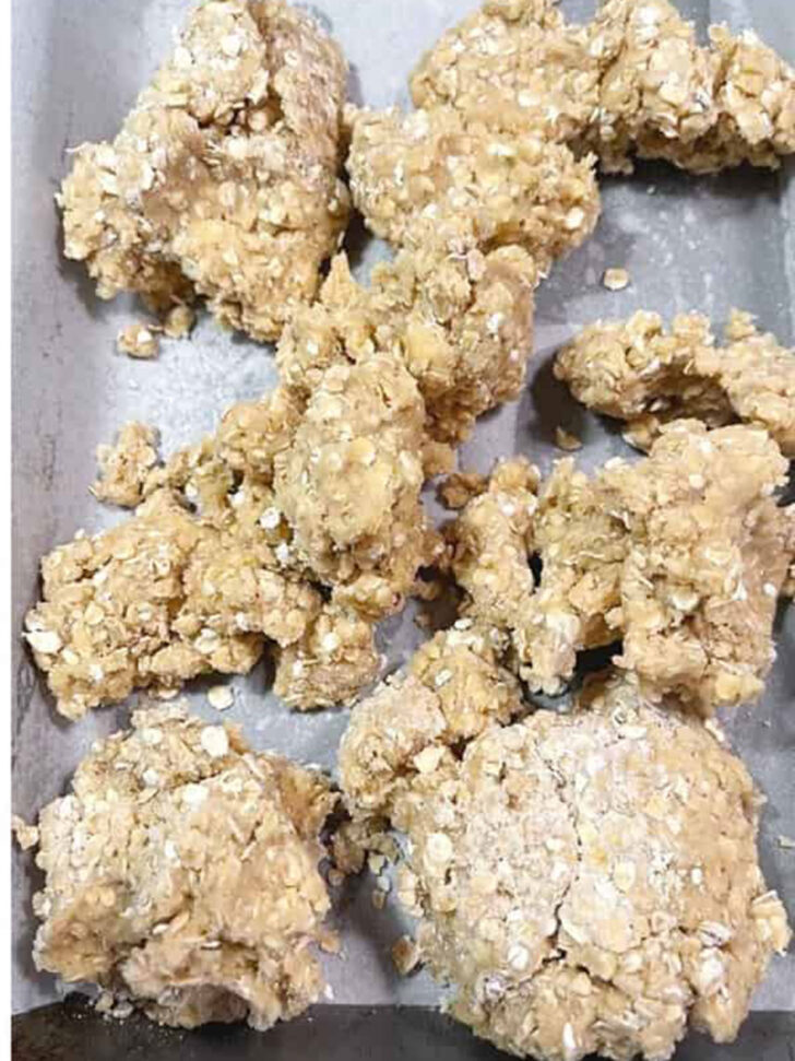 Dough added to the parchment-lined baking pan.