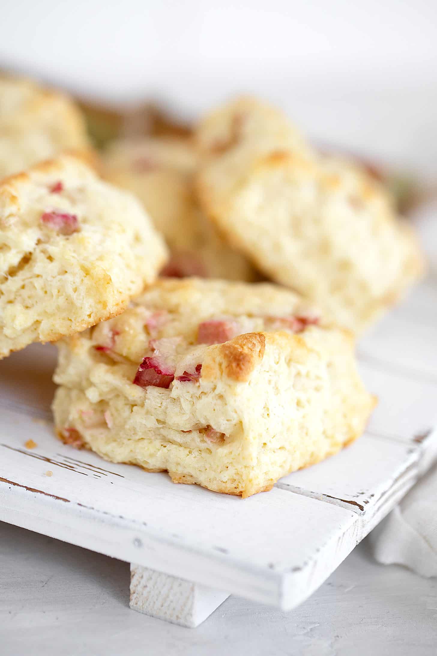 rhubarb scones on white serving board