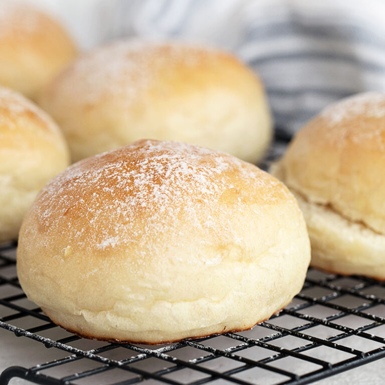 soft hamburger buns on cooling rack