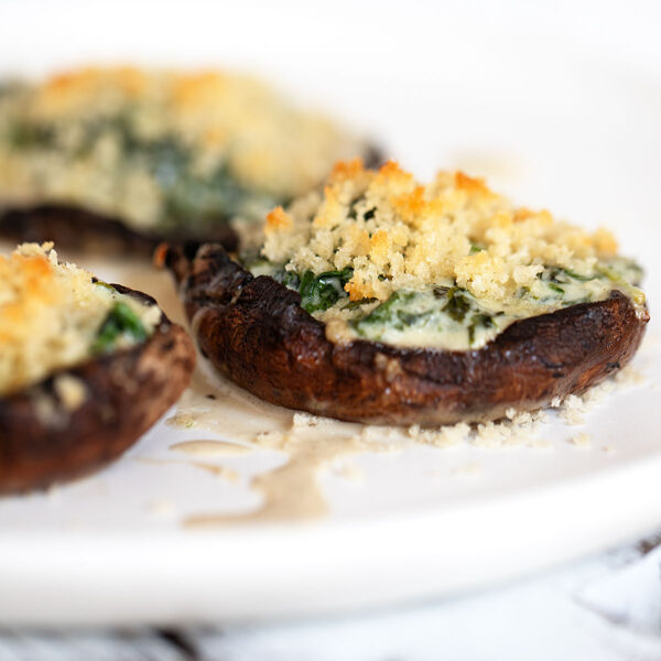 spinach stuffed portobello mushrooms on plate