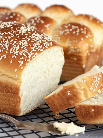sliced buttermilk bread on cooling rack