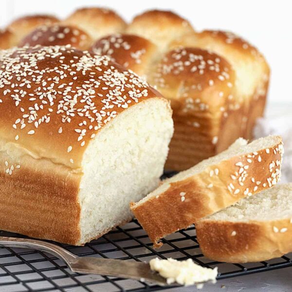 sliced buttermilk bread on cooling rack