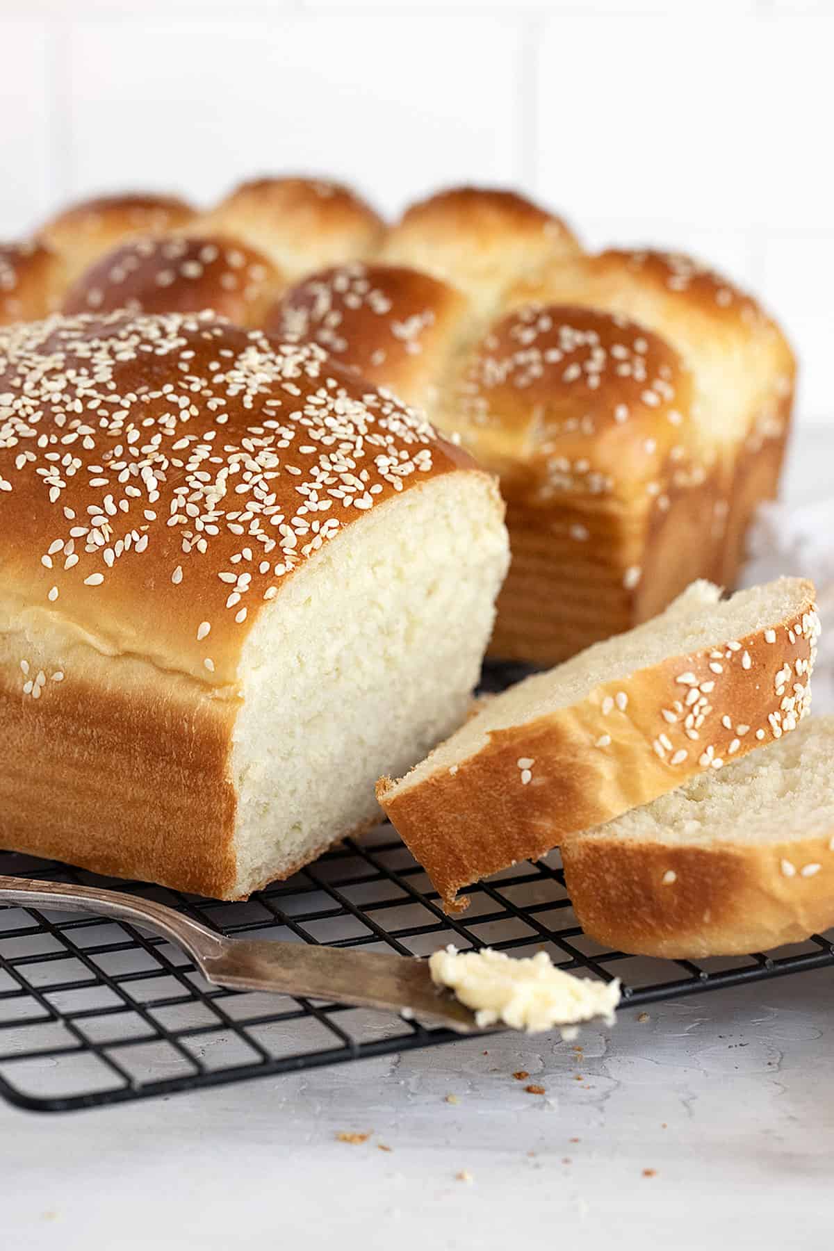 buttermilk bread loaves on cooling rack