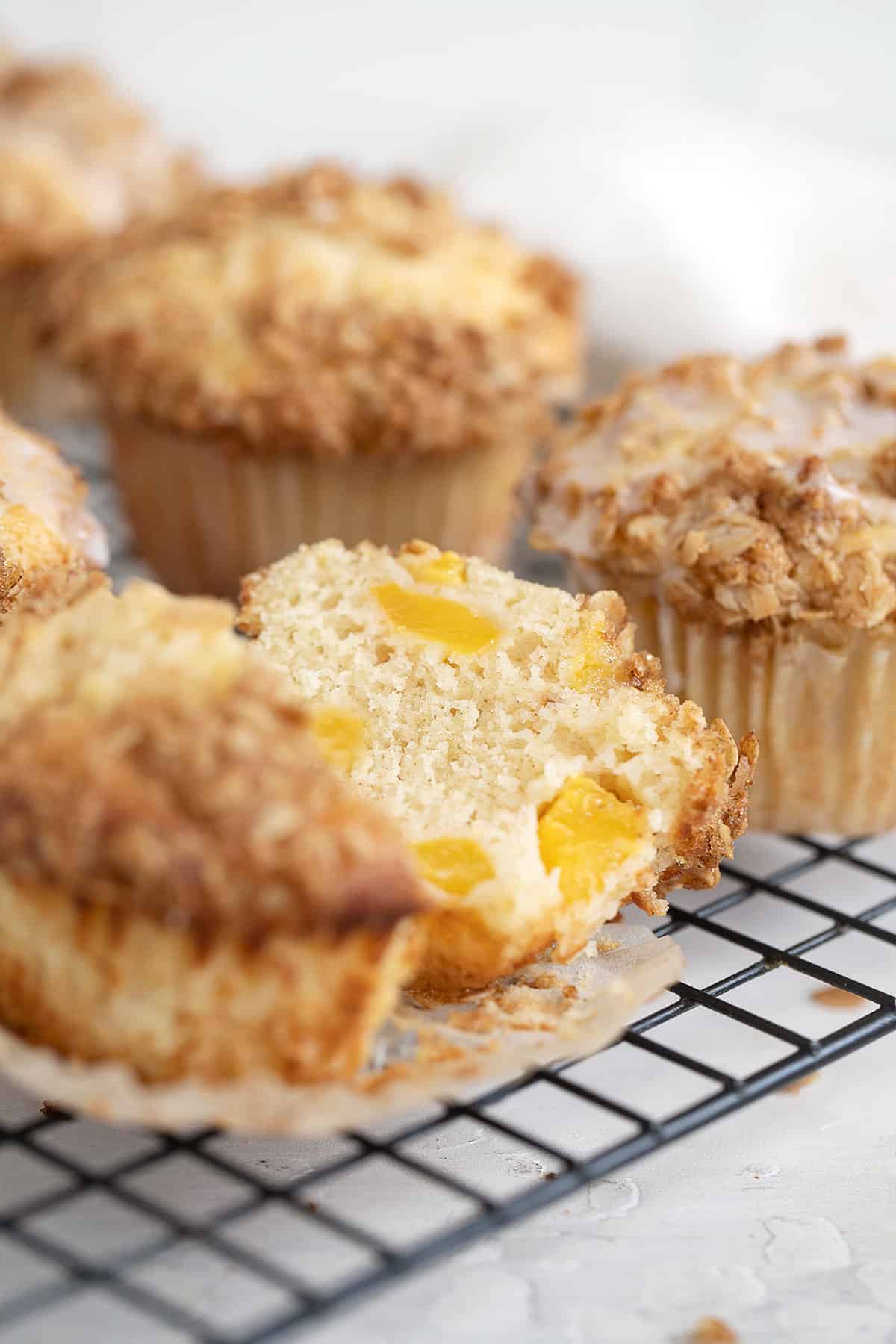 peach crisp muffins on cooling rack