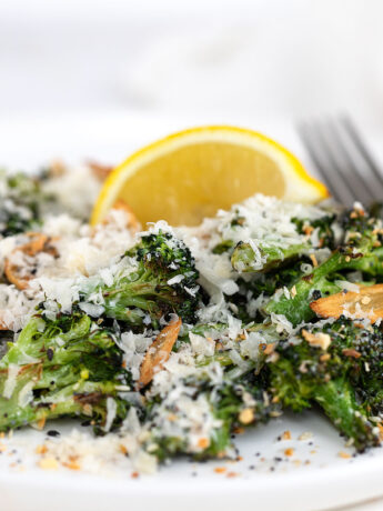 roasted broccoli Caesar salad on plate with fork