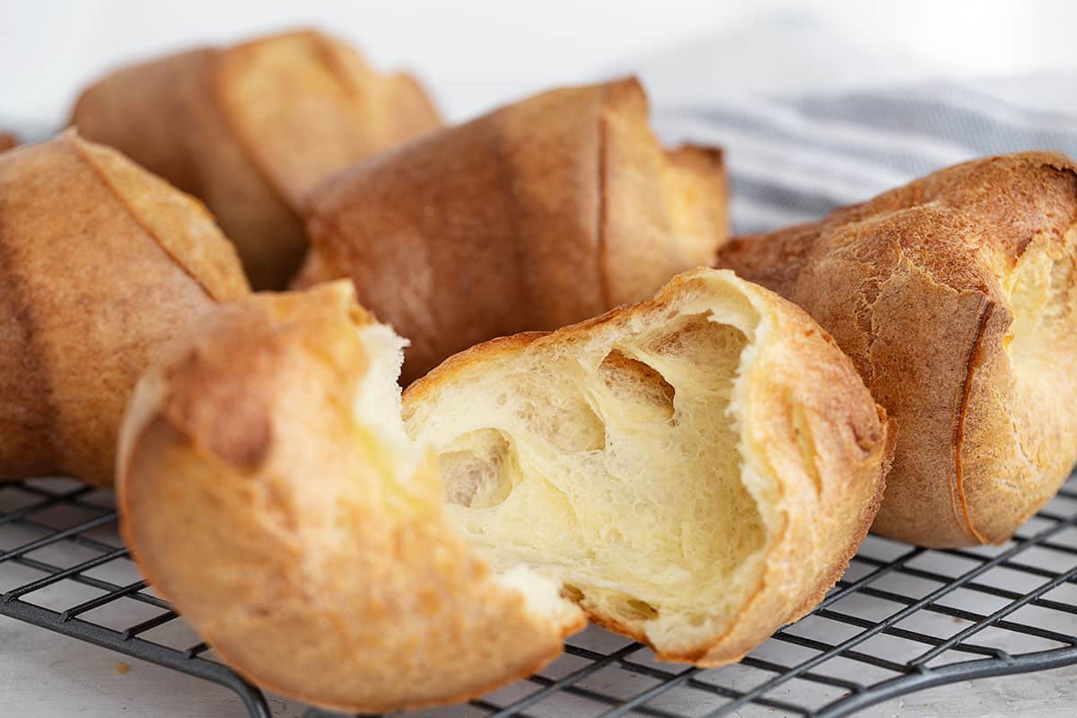 popovers on cooling rack with one split open