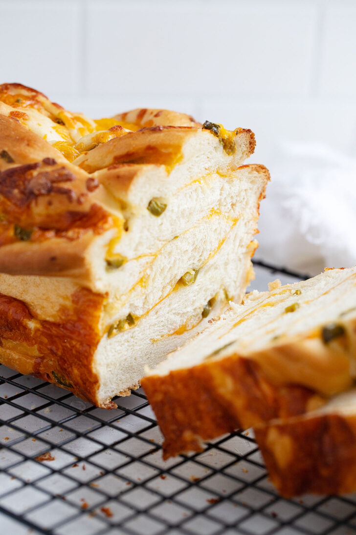 jalapeno cheese bread sliced on cooling rack