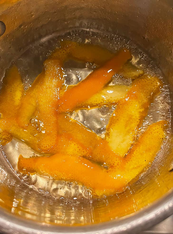 boiling orange peel with sugar