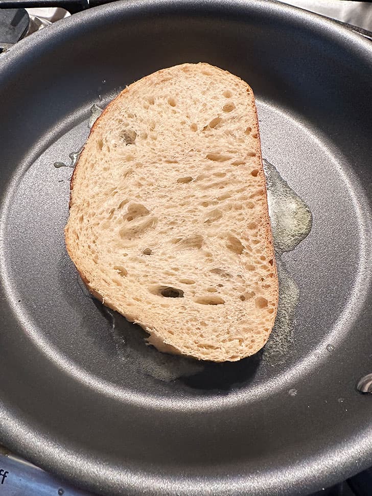 adding bottom slice of bread
