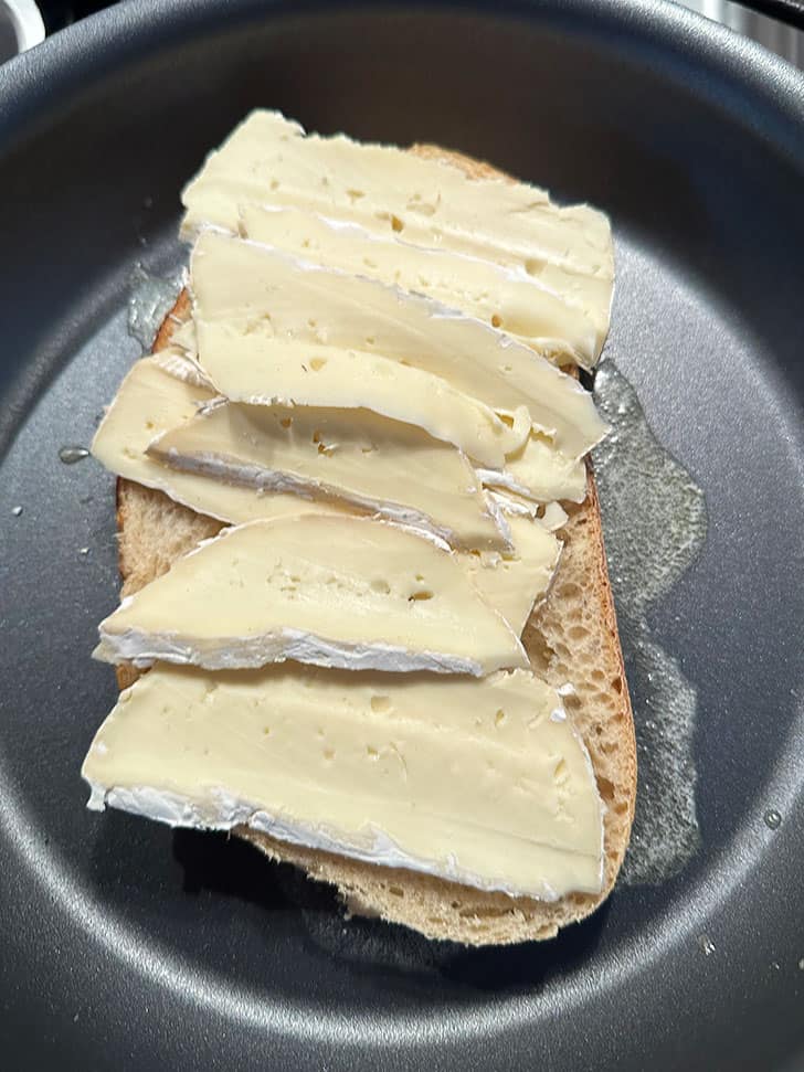 adding sliced brie cheese