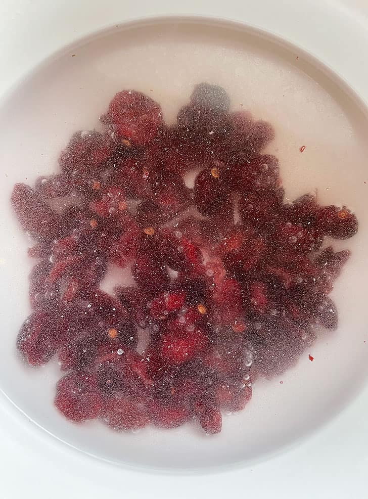 soaking dried cranberries in hot water