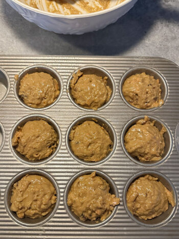 9 muffin cups filled and ready to bake