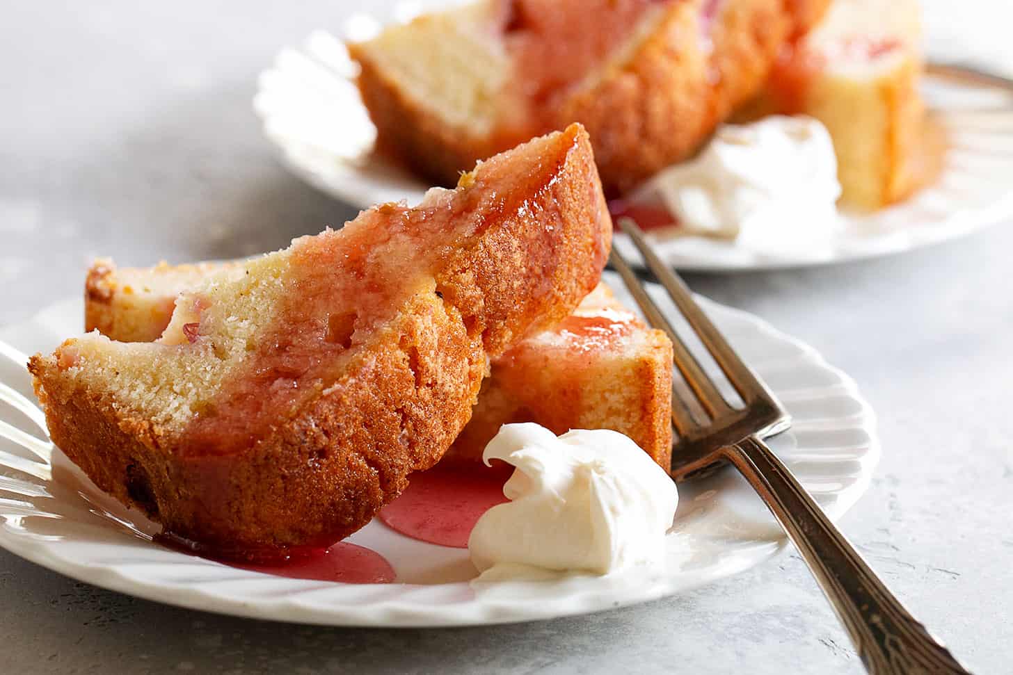 rhubarb tea cake with rhubarb syrup on plate