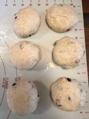 forming dough pieces into balls