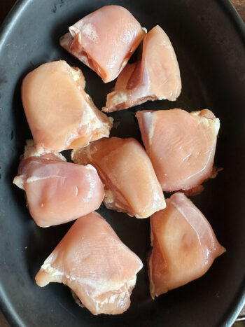 chicken placed in baking dish