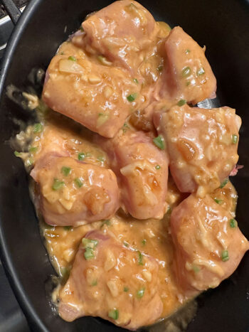 sauce poured over chicken before cooking