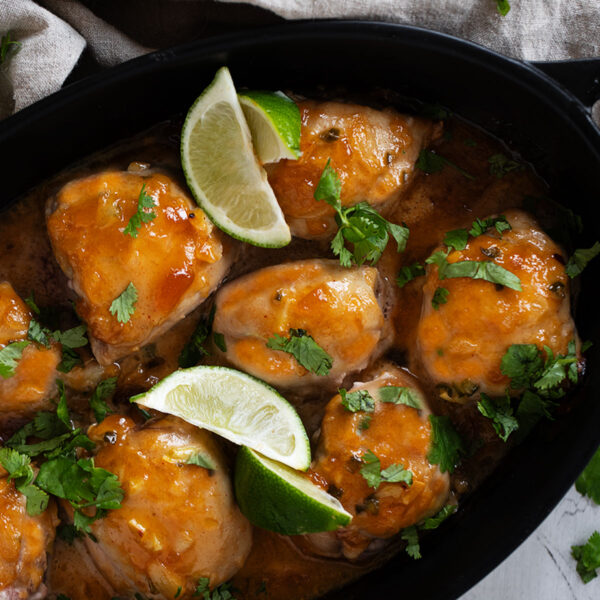 mango chutney chicken in baking dish