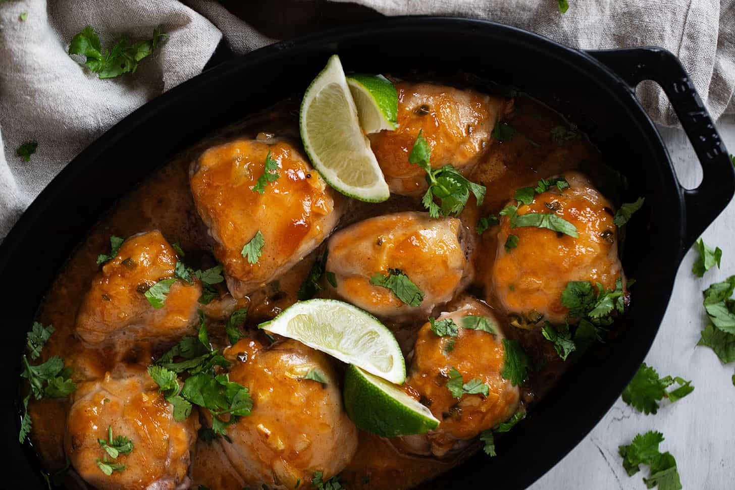 mango chutney chicken in baking dish