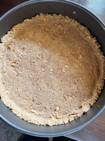graham cracker crumb after pressing into pan