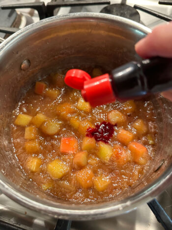 adding food colouring to rhubarb compote