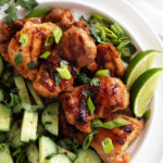 grilled lemongrass chicken thighs on plate