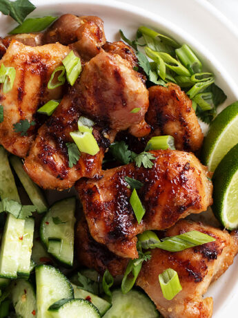 grilled lemongrass chicken thighs on plate