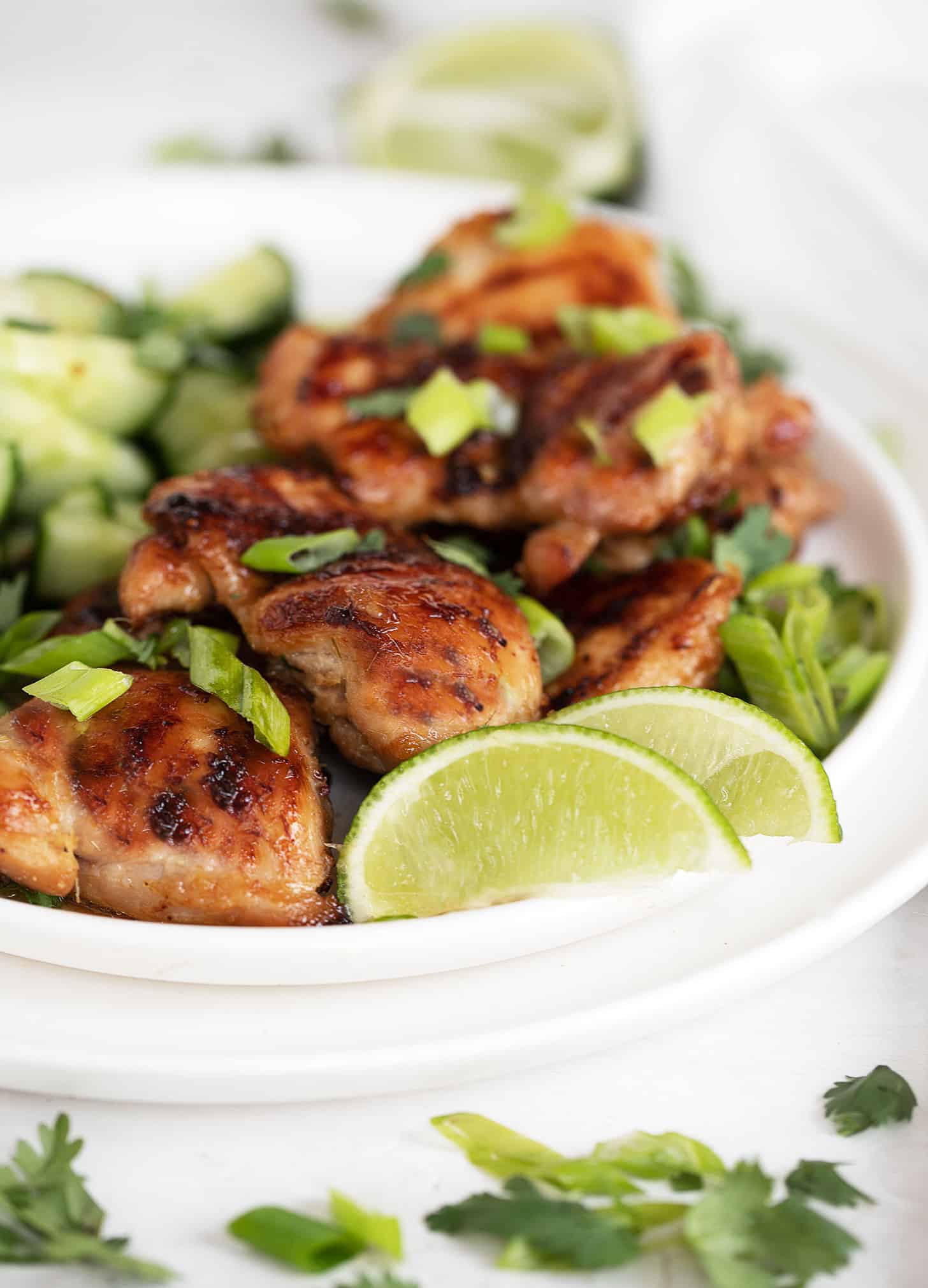 grilled lemongrass chicken thighs on plate