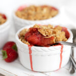 strawberry crumble in white ramekins