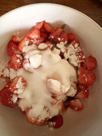 strawberries in bowl with sugar and cornstarch