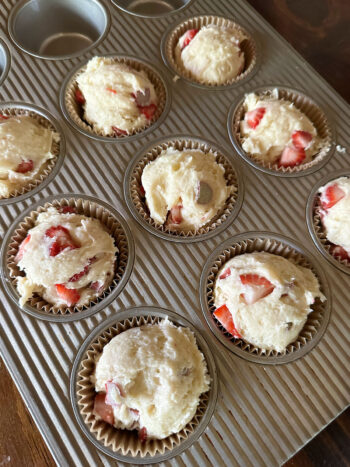 batter scooped into muffin cups