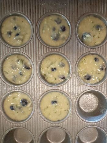 batter in muffin cups before baking