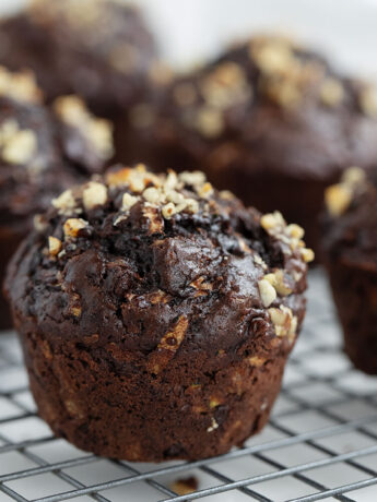 chocolate zucchini muffins on cooling rack
