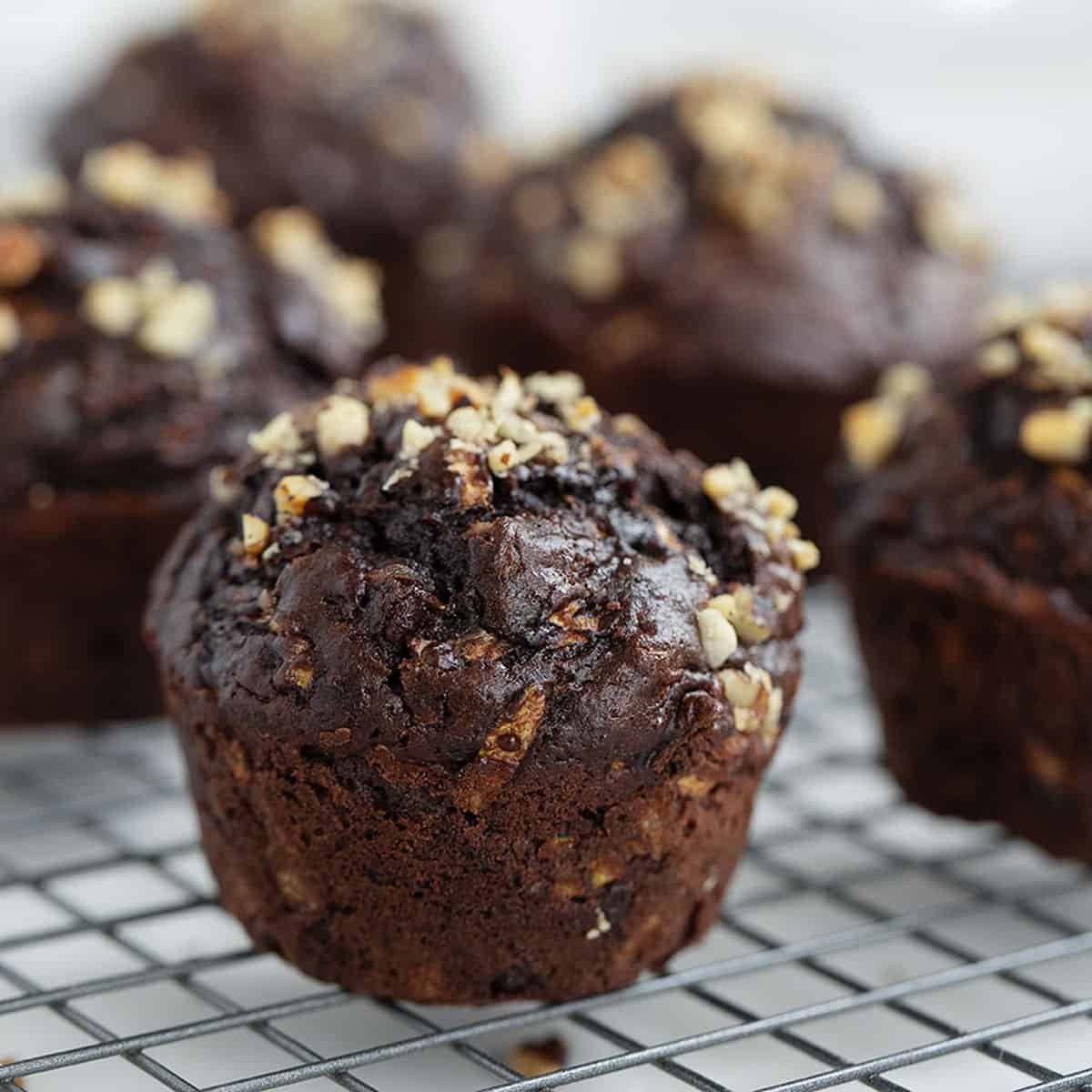 chocolate zucchini muffins on cooling rack