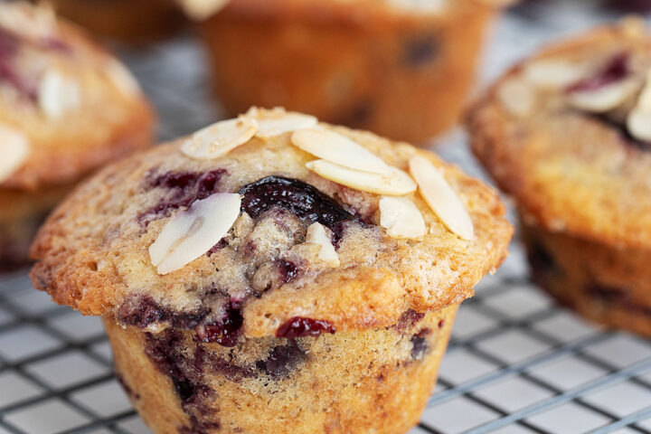 cherry muffins on cooling rack