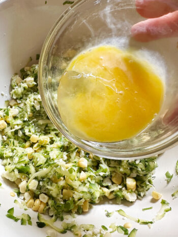 adding egg to vegetable mixture