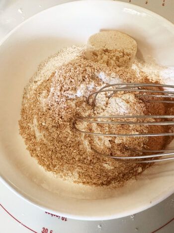 dry ingredients in bowl with whisk