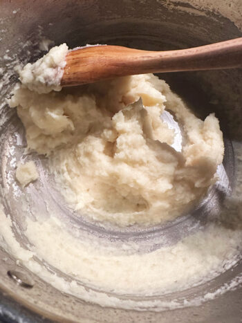 Finished parsnip purée in saucepan.