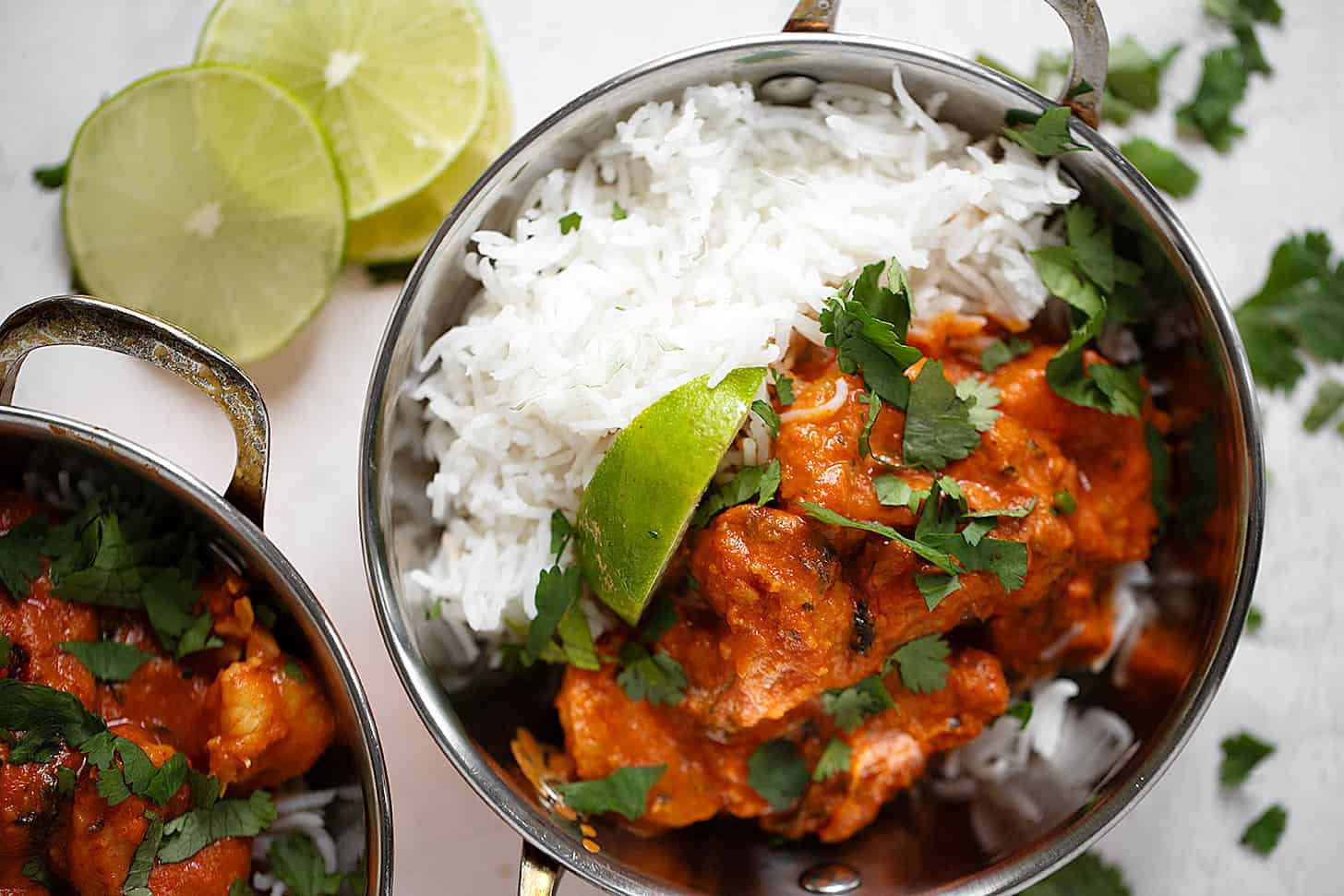 shrimp tikka masala in copper bowls with rice