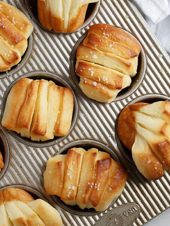 Butterflake rolls in muffin tin.