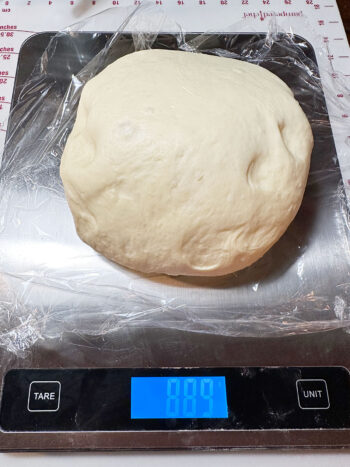 weighing out the dough to divide in two