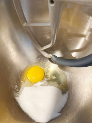egg and sugar in mixer with paddle attachement